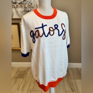 New! QUEEN OF SPARKLES White Sweater with Orange and Blue Accents
